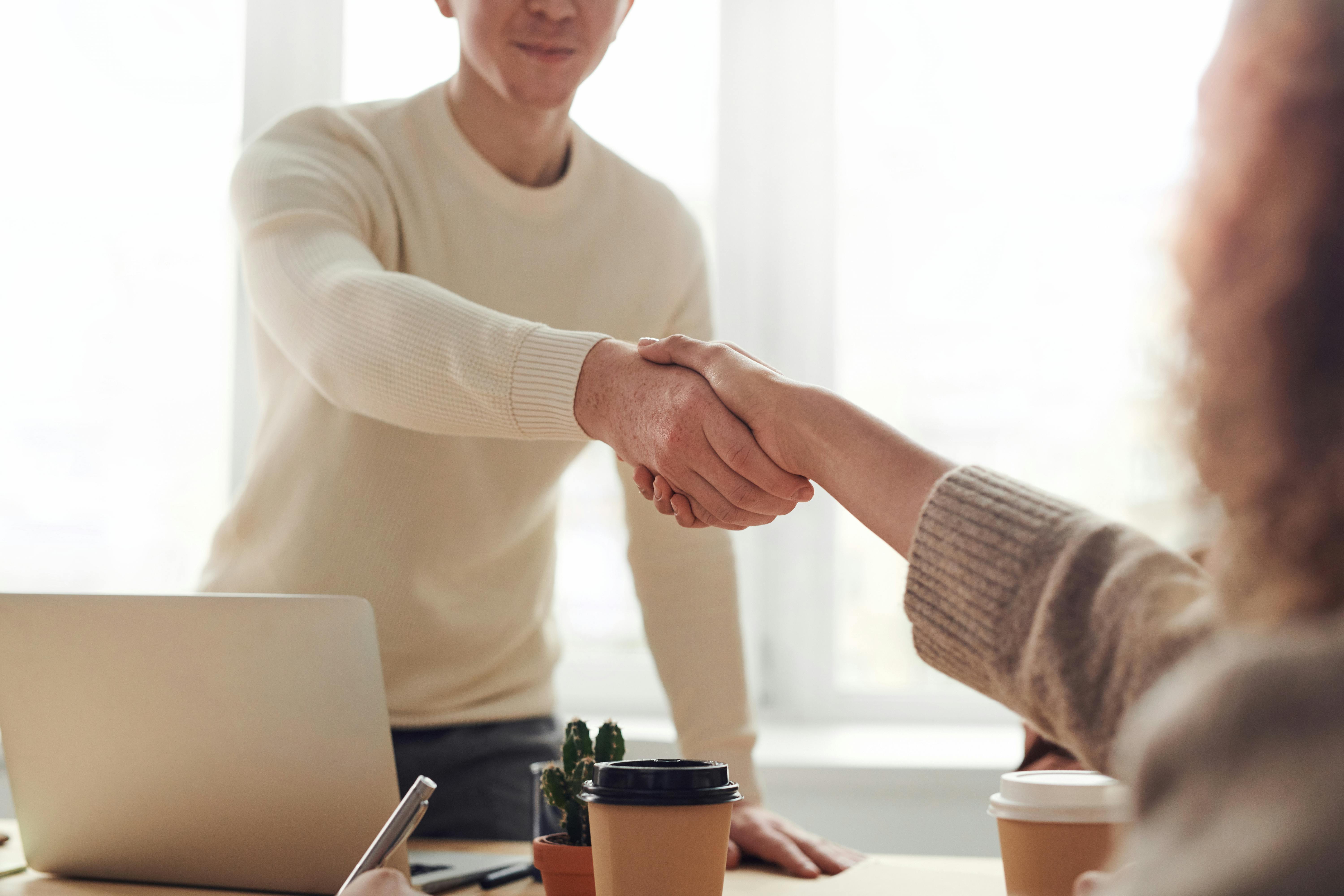A person doing handshake